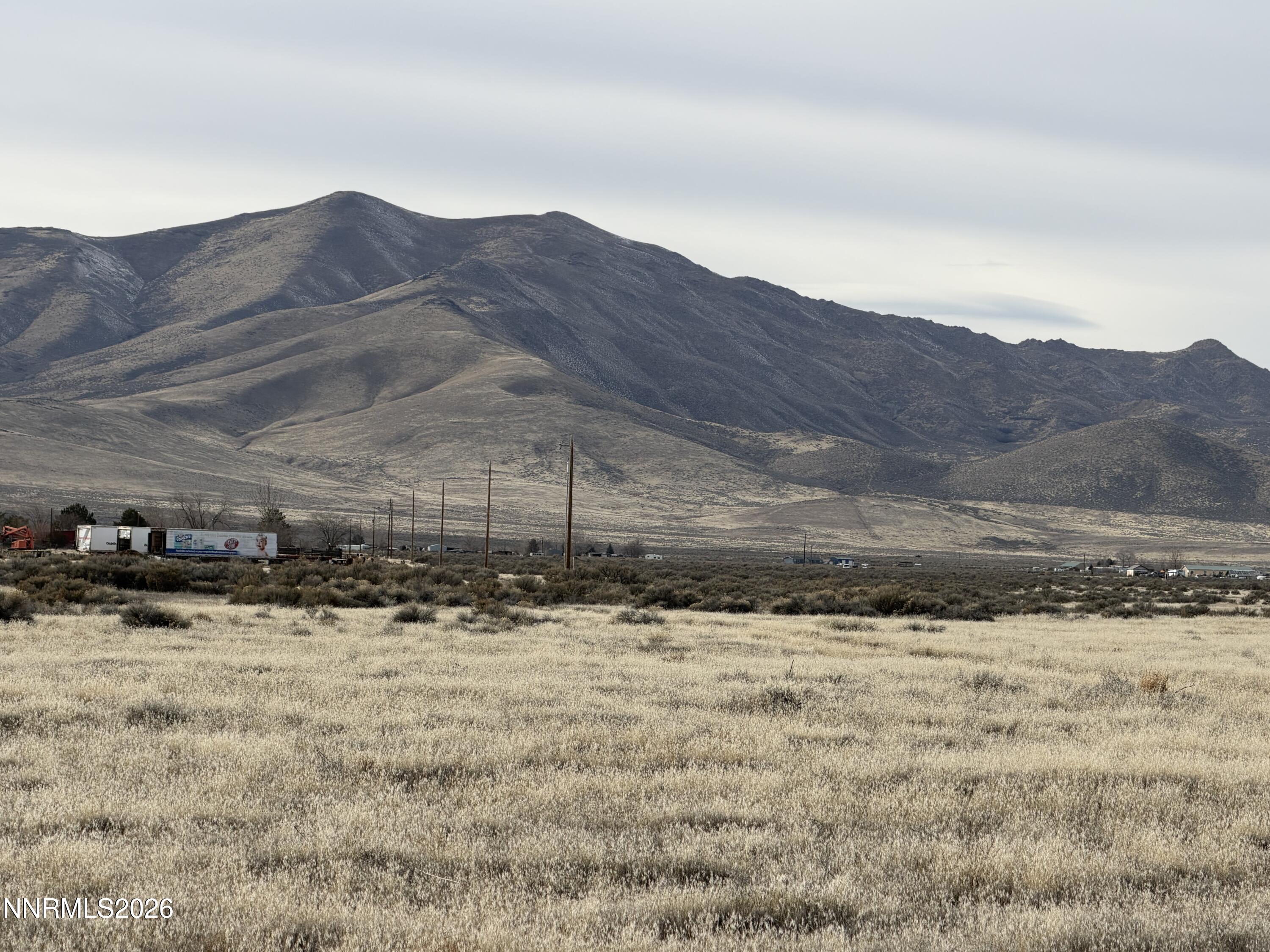 0 Pioneer Road, Unit 618140 Winnemucca, NV 89445 - Photo 9 of 9 a view of a yard with a snow