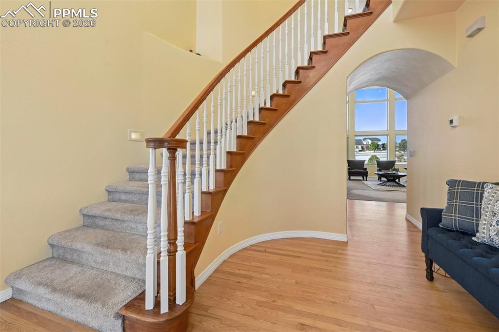 19610 Rathbone Circle Monument, CO 80132 - Photo 10 of 41 a view of entryway and hall with wooden floor