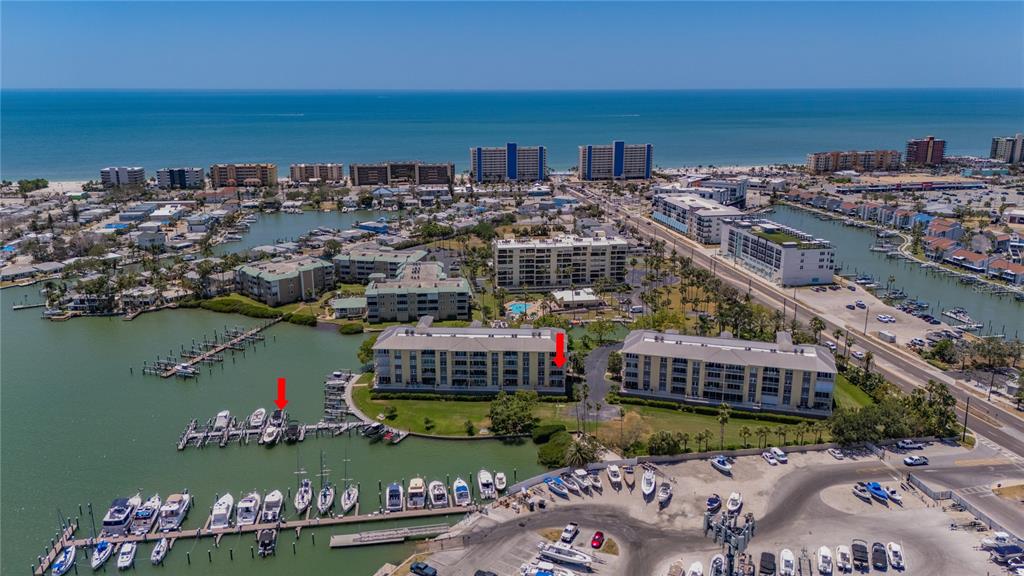 425 150th Avenue, Unit 2301 Madeira Beach, FL 33708 - Photo 44 of 67 a view of a city and ocean view