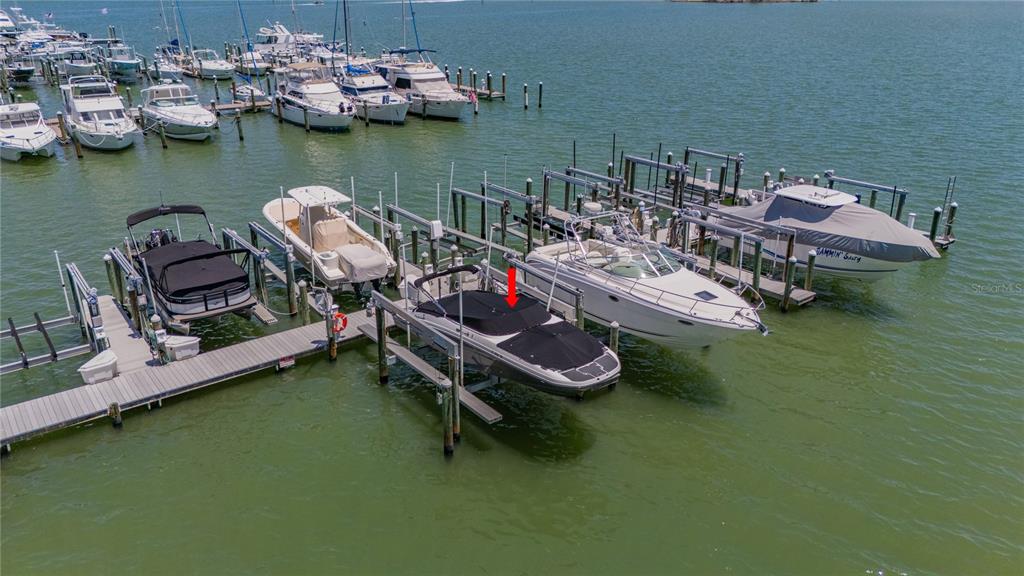 425 150th Avenue, Unit 2301 Madeira Beach, FL 33708 - Photo 51 of 67 a view of a lake with sitting area