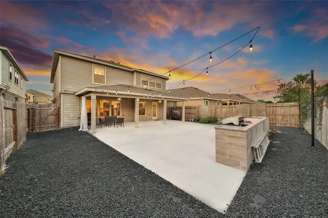 a view of a house with a roof deck
