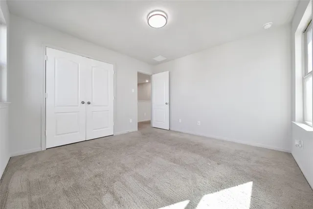 a bathroom with a sink toilet and mirror