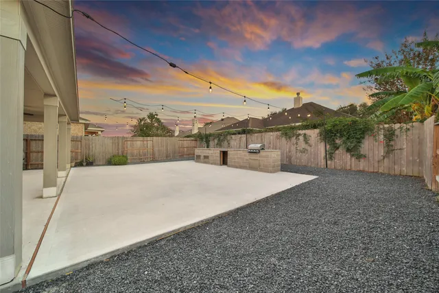 a view of a flesh screen tv with a ceiling fan