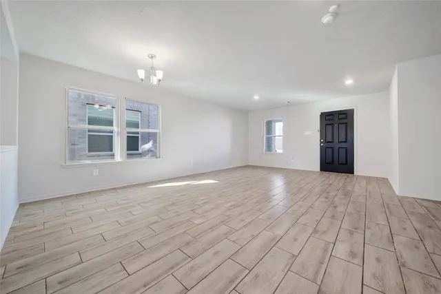 a view of empty room with windows