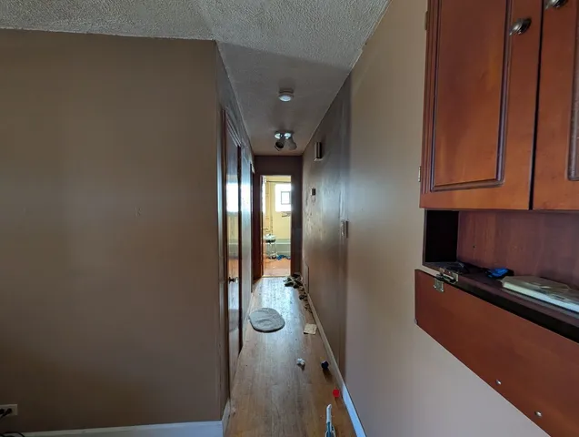 a view of a hallway with elevator