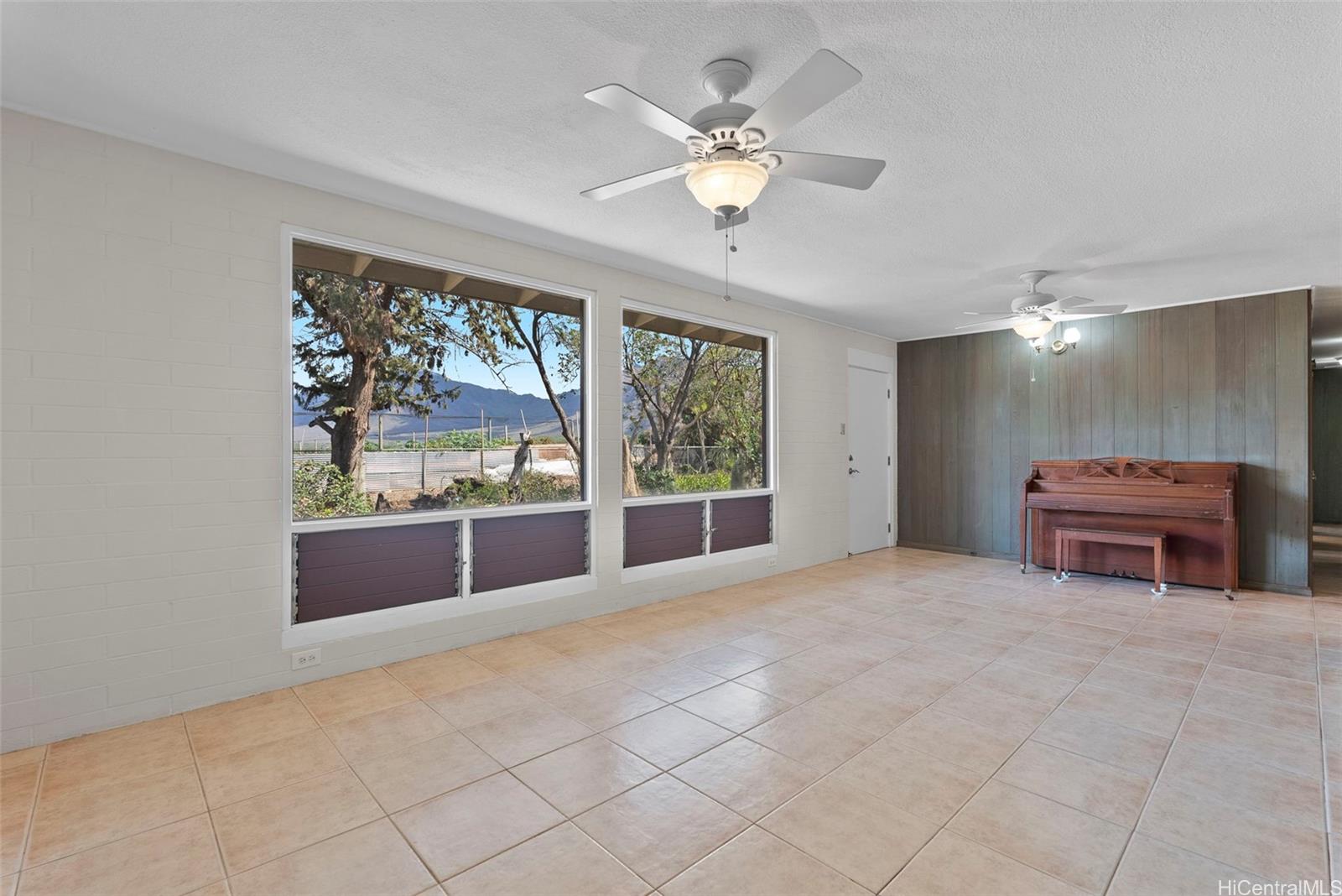 87-1087 Apuupuu Road Waianae, HI 96792 - Photo 16 of 25 a view of an empty room with windows