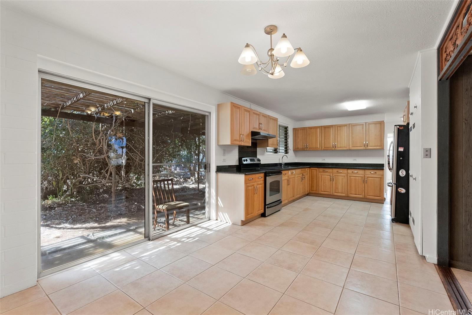 87-1087 Apuupuu Road Waianae, HI 96792 - Photo 18 of 25 a view of a kitchen with a sink and an empty room