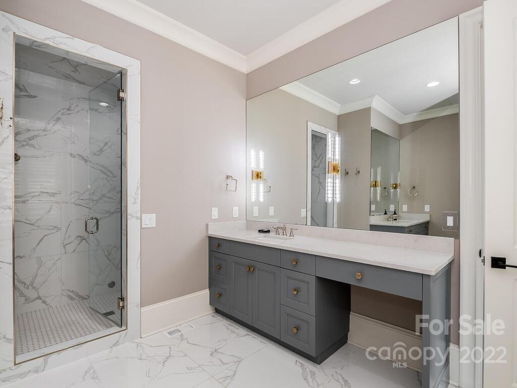 3013 Manor Road Charlotte, NC 28209 - Photo 11 of 41 a bathroom with a double vanity sink mirror and shower