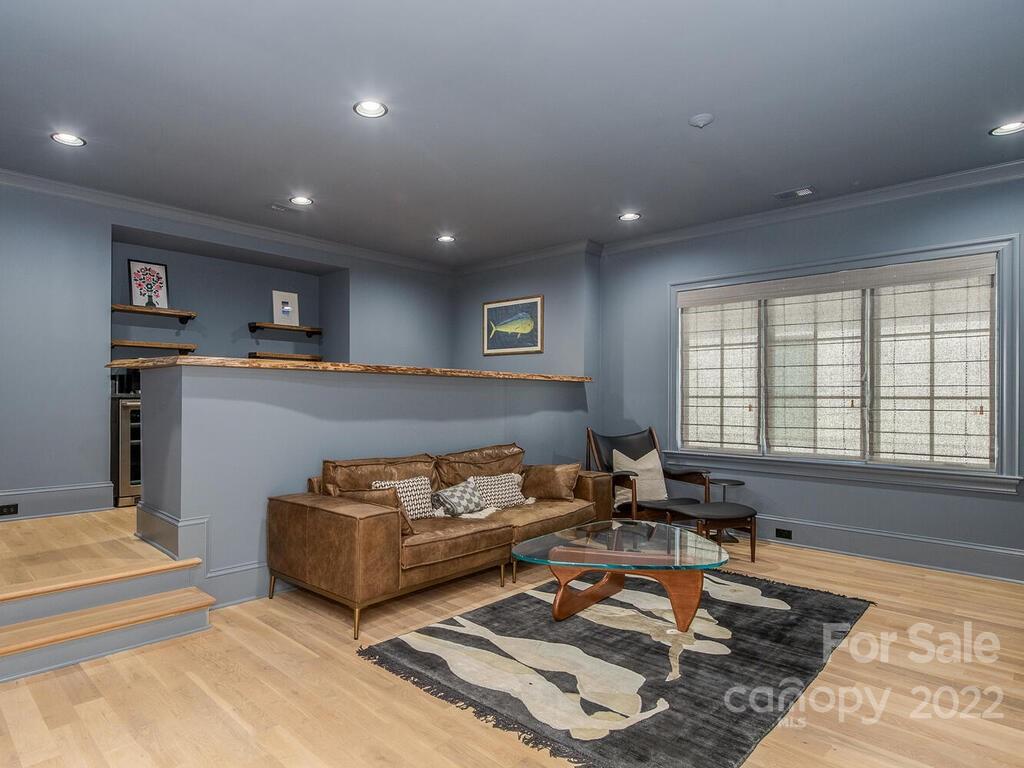 3013 Manor Road Charlotte, NC 28209 - Photo 21 of 41 a living room with furniture and a rug