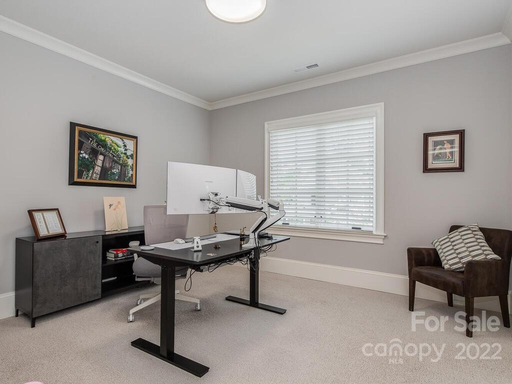 3013 Manor Road Charlotte, NC 28209 - Photo 30 of 41 a view of a workspace with furniture and a window