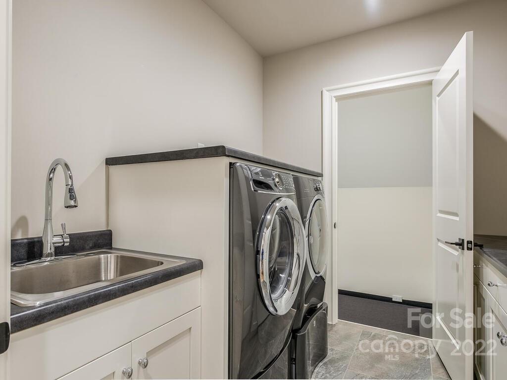 3013 Manor Road Charlotte, NC 28209 - Photo 32 of 41 a utility room with dryer and washer