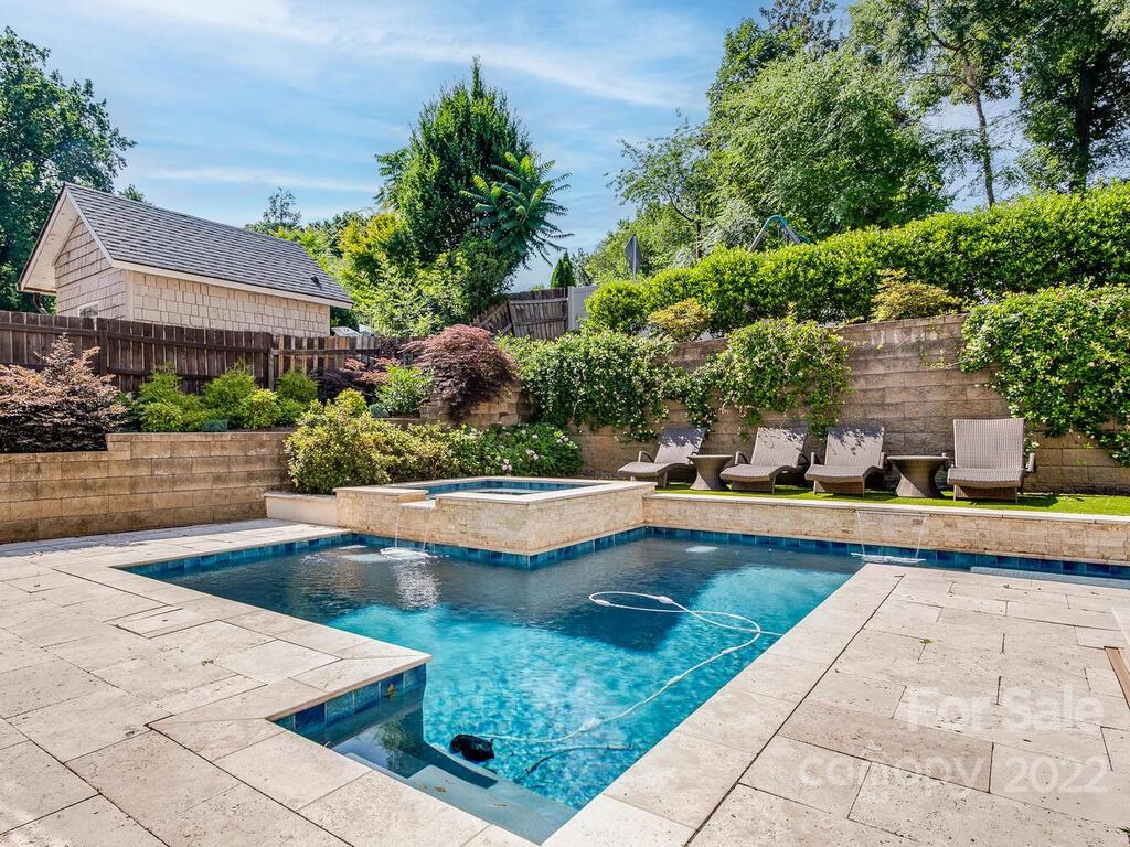 3013 Manor Road Charlotte, NC 28209 - Photo 35 of 41 a view of swimming pool with outdoor seating and plants