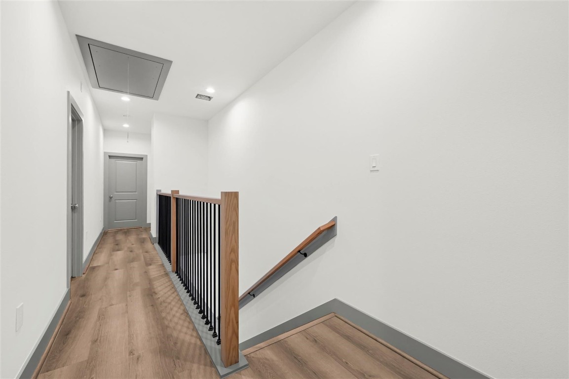 4019 Stassen Street, Unit A Houston, TX 77051 - Photo 18 of 35 a view of a hallway with wooden floor and entryway