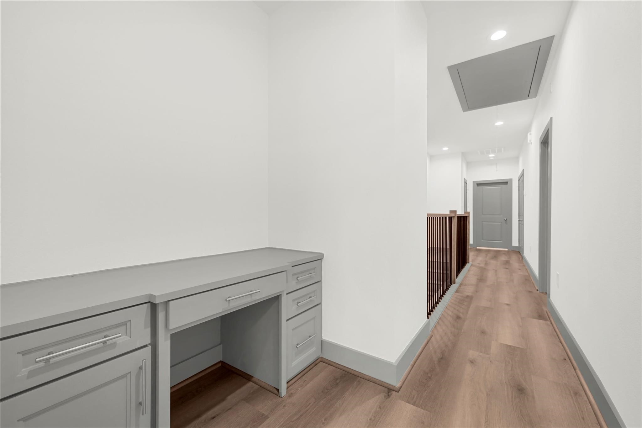 4019 Stassen Street, Unit A Houston, TX 77051 - Photo 19 of 35 A generous built-in desk area with a view of the upstairs primary suite located at the front of the home.