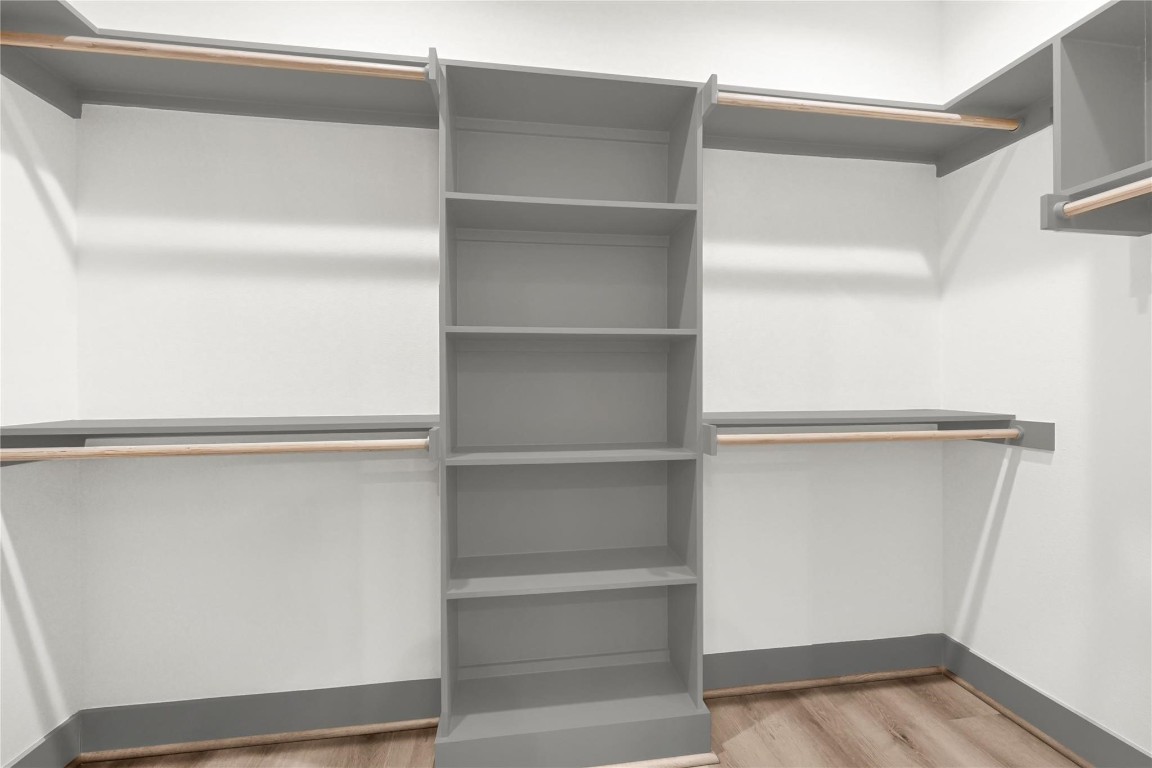 4019 Stassen Street, Unit A Houston, TX 77051 - Photo 26 of 35 a view of walk in closet with empty racks