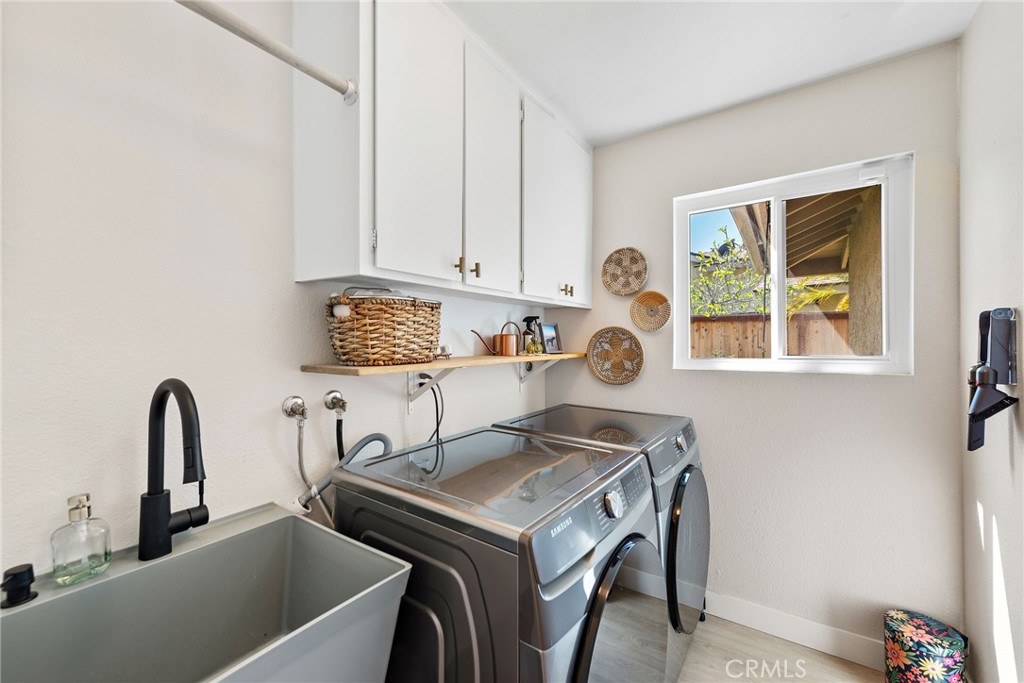 5649 Roane Drive Oceanside, CA 92057 - Photo 15 of 42 a view of a storage and utility room with a window