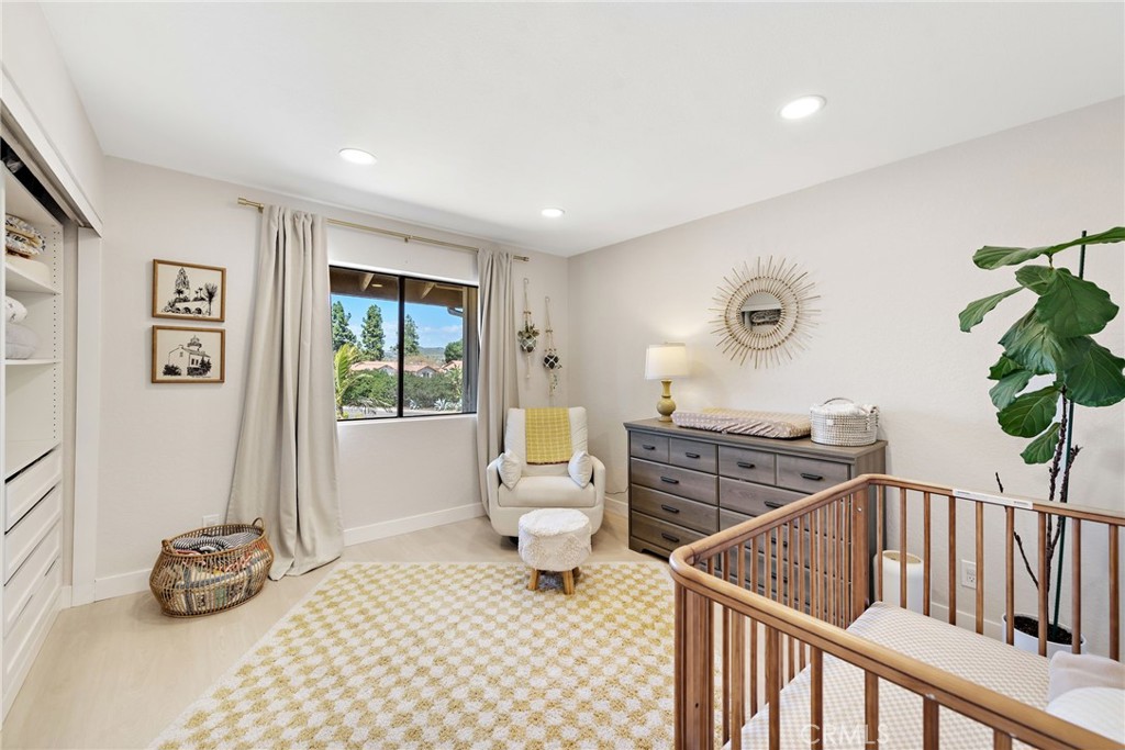 5649 Roane Drive Oceanside, CA 92057 - Photo 24 of 42 a bedroom with furniture and a window