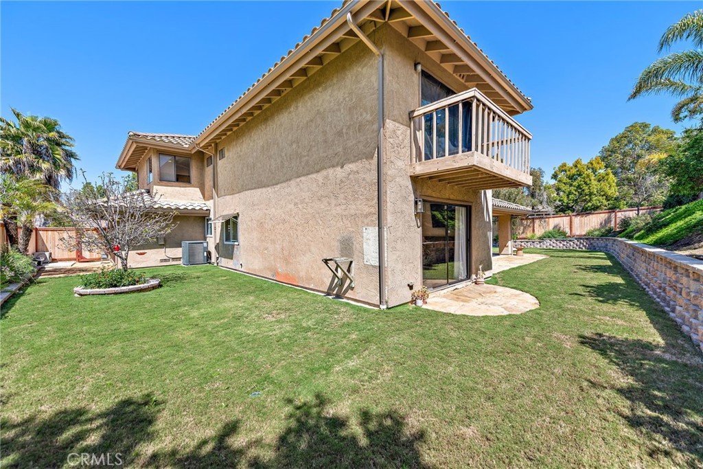 5649 Roane Drive Oceanside, CA 92057 - Photo 27 of 42 a front view of a house with garden