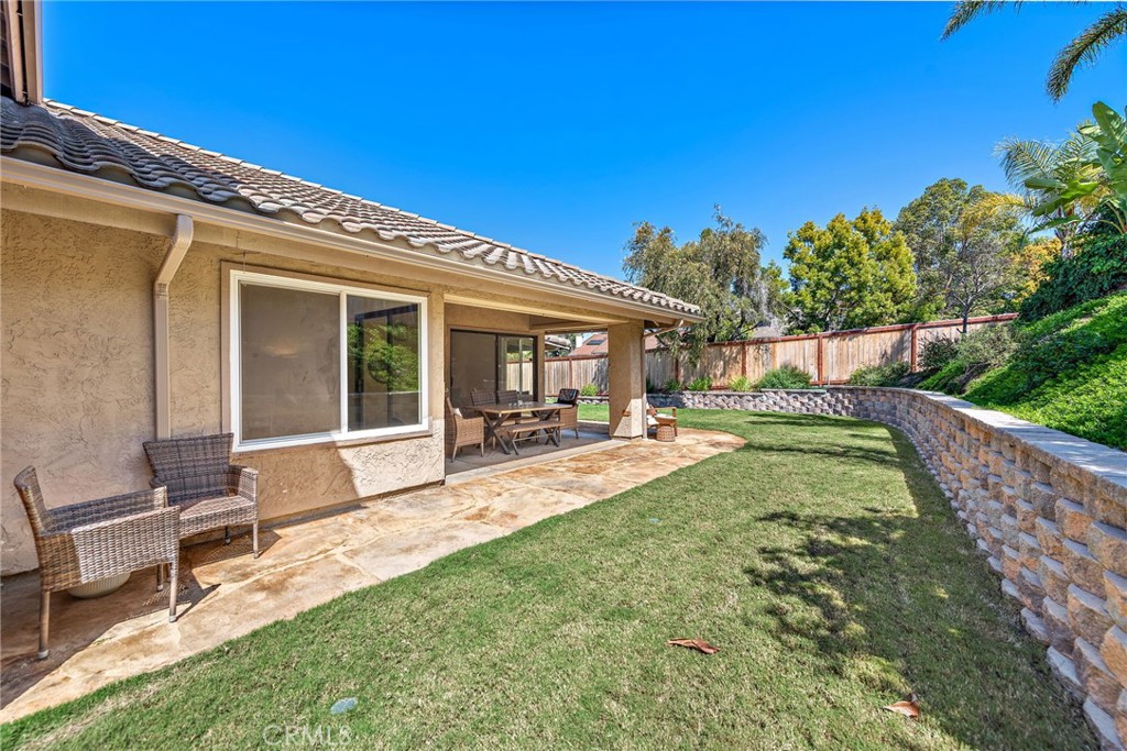 5649 Roane Drive Oceanside, CA 92057 - Photo 29 of 42 a view of a backyard with sitting area and garden