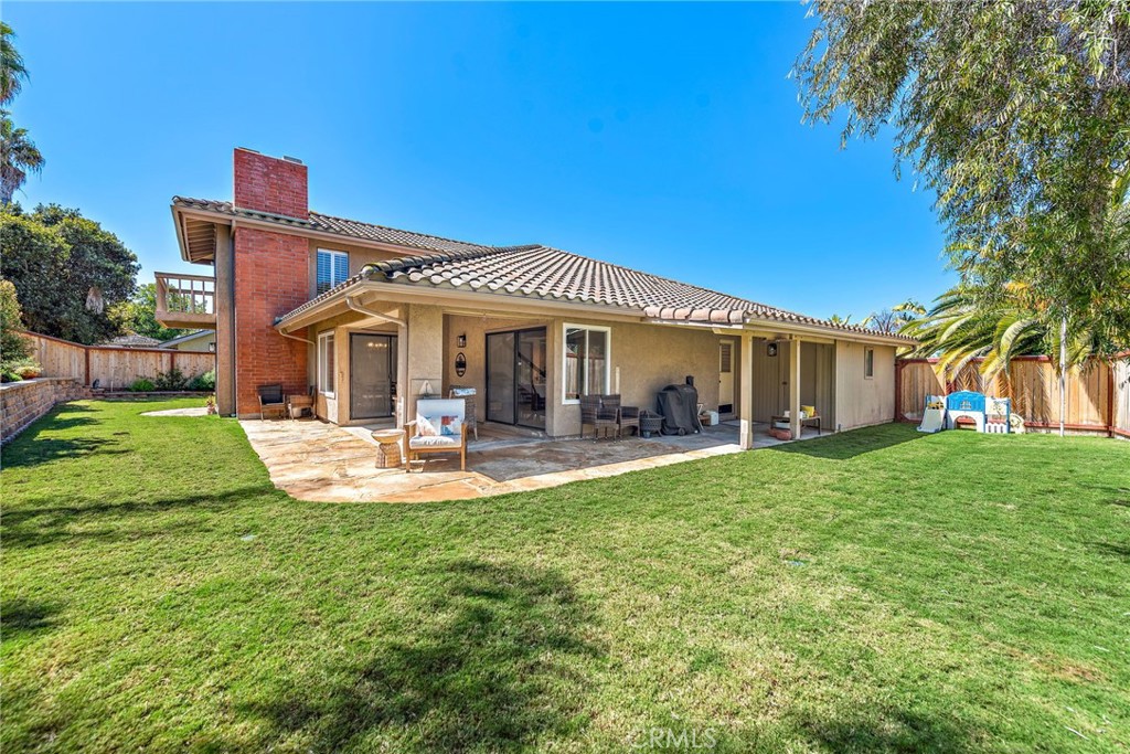 5649 Roane Drive Oceanside, CA 92057 - Photo 30 of 42 a view of a house with a yard porch and sitting area