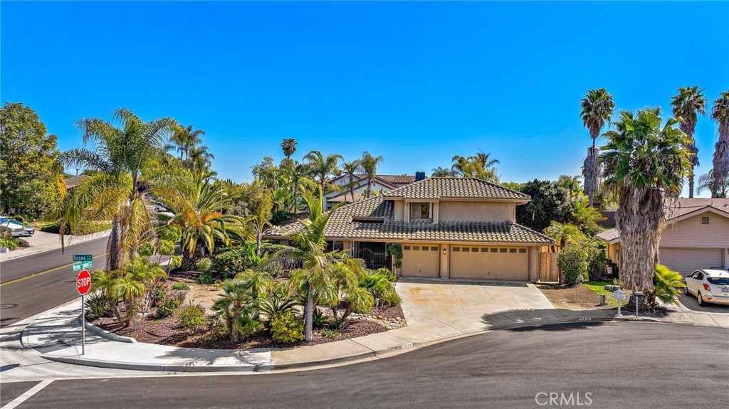 5649 Roane Drive Oceanside, CA 92057 - Photo 31 of 42 a front view of a house with a yard