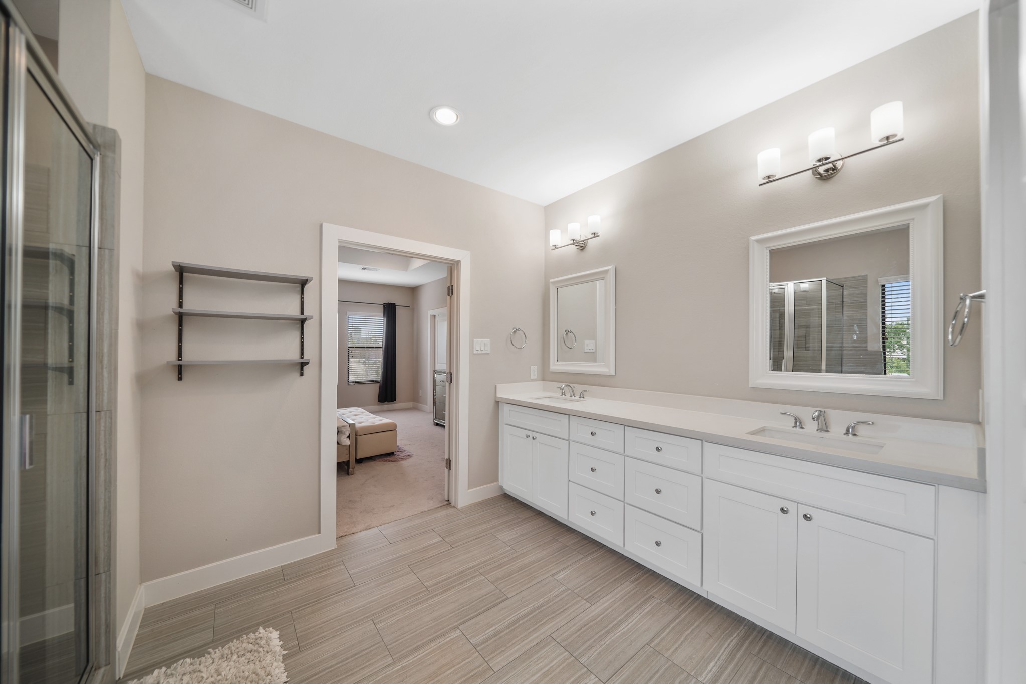 1824 Bonner Street Houston, TX 77007 - Photo 29 of 39 a bathroom with a double vanity sink and mirror