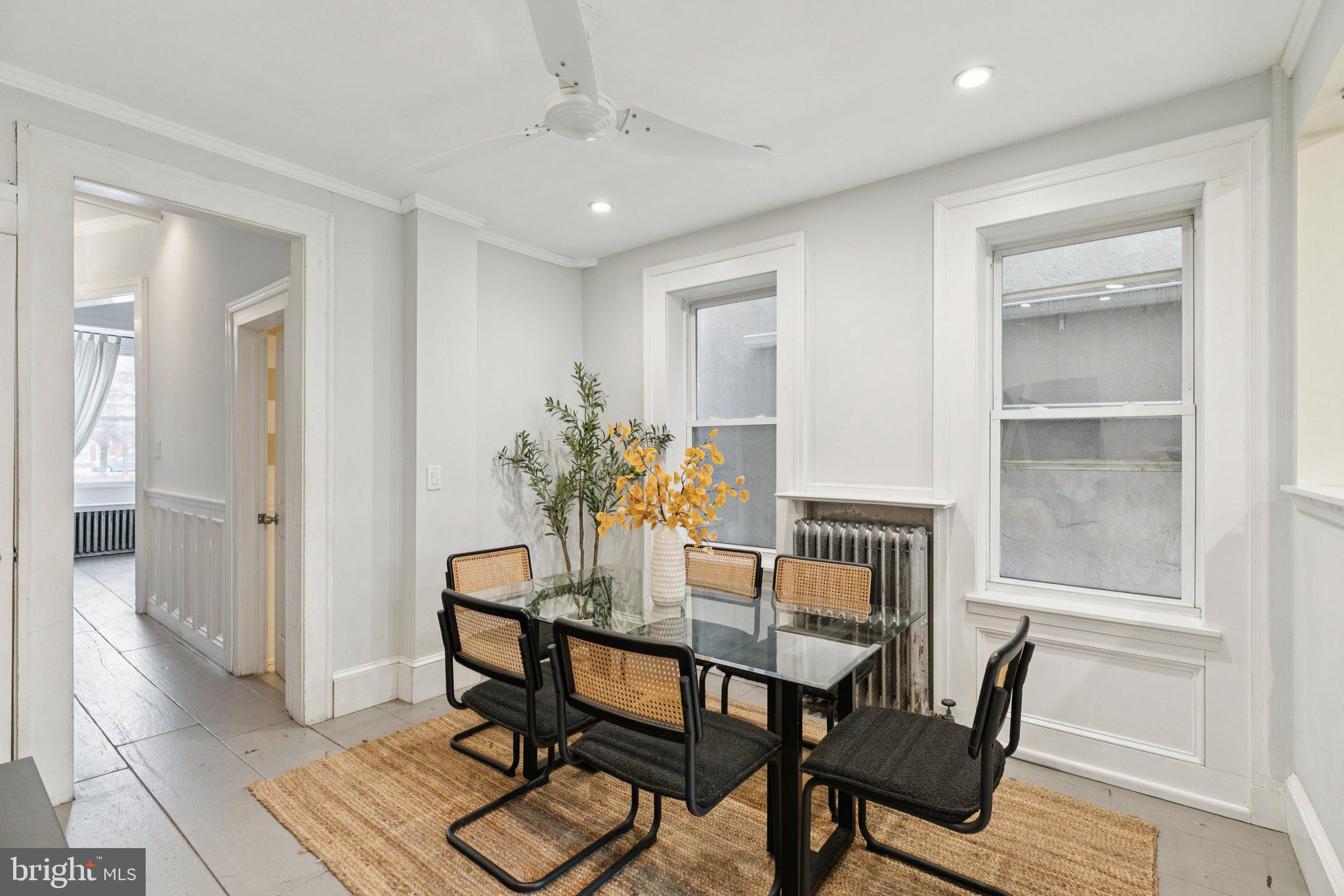 1228 Catharine Street Philadelphia, PA 19147 - Photo 12 of 48 a dining room with furniture and window