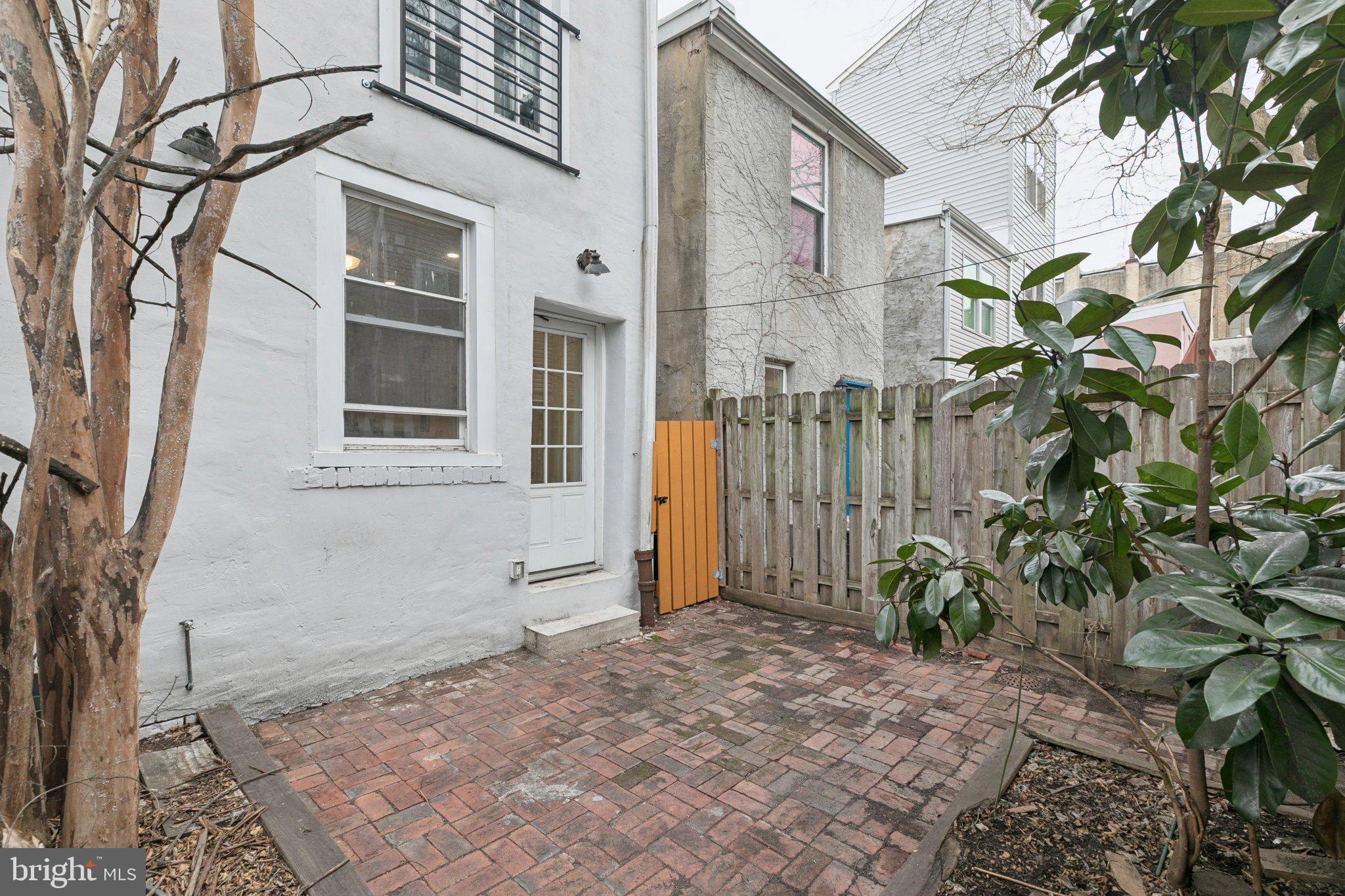 1228 Catharine Street Philadelphia, PA 19147 - Photo 19 of 48 a view of a house with a yard