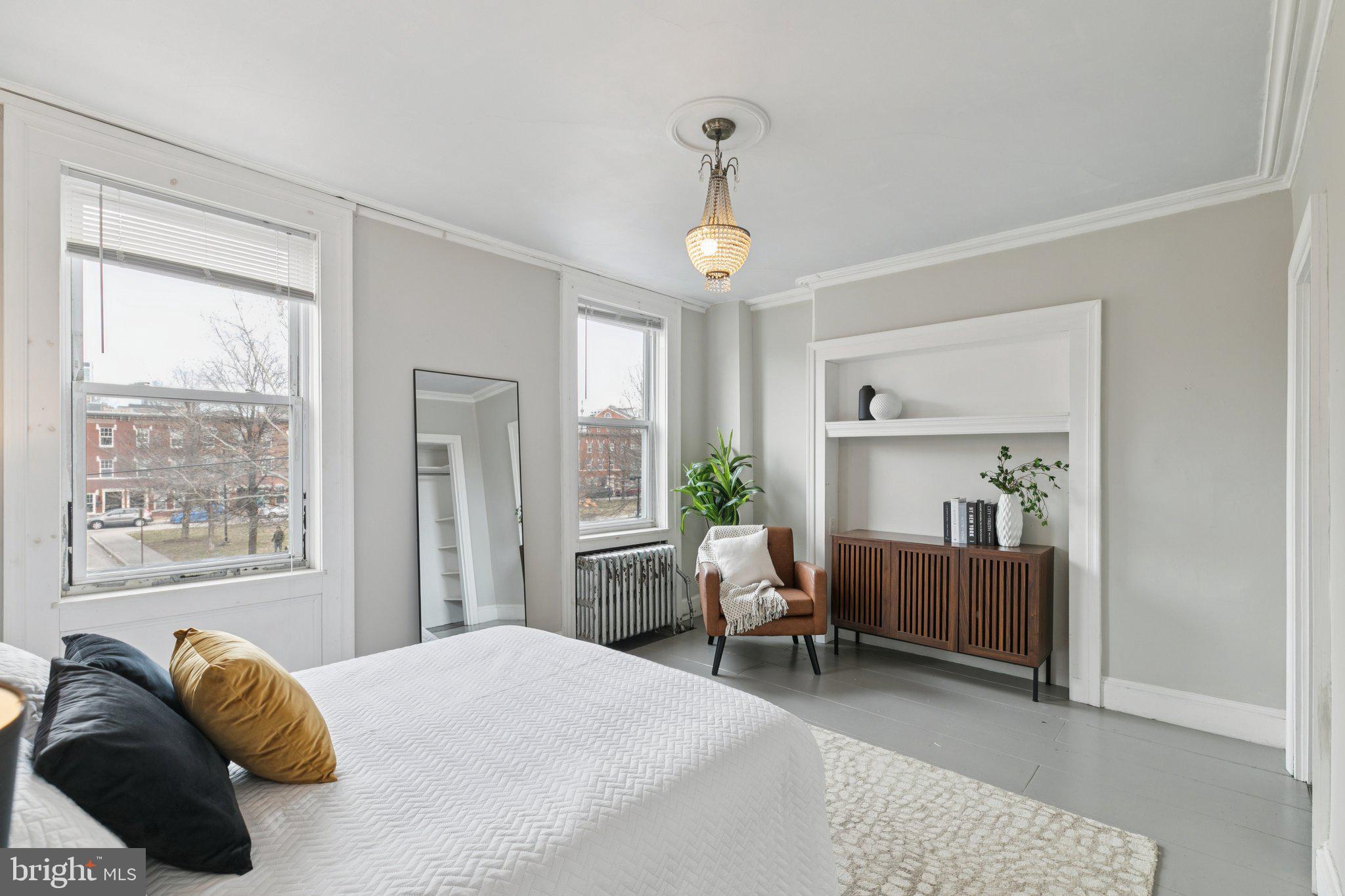 1228 Catharine Street Philadelphia, PA 19147 - Photo 29 of 48 a bedroom with a bed furniture and a window