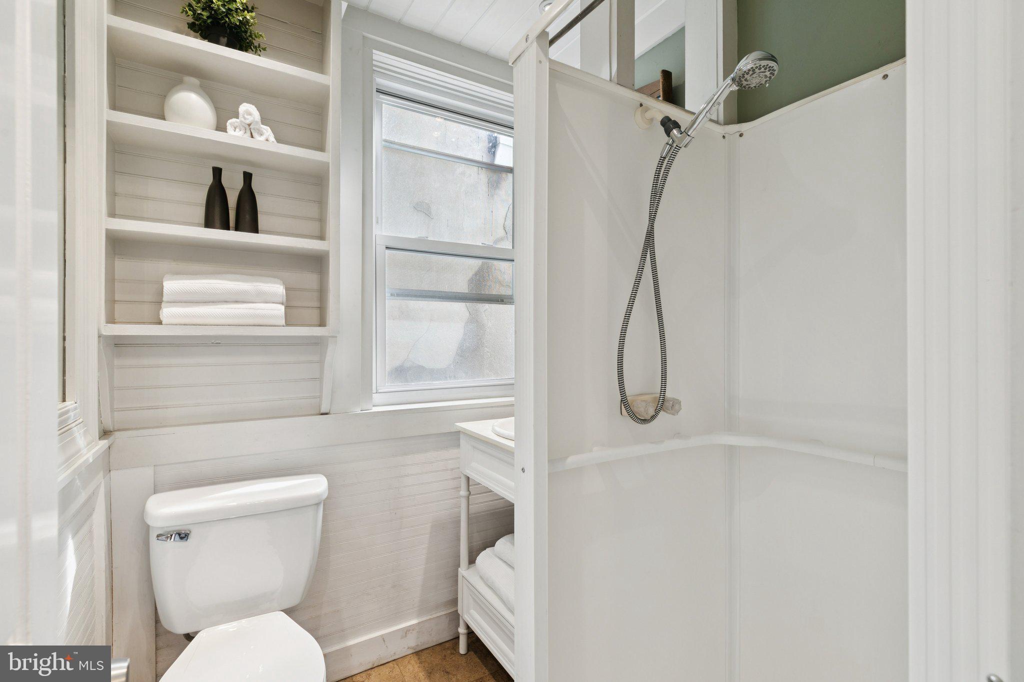 1228 Catharine Street Philadelphia, PA 19147 - Photo 31 of 48 a bathroom with a toilet and a shower