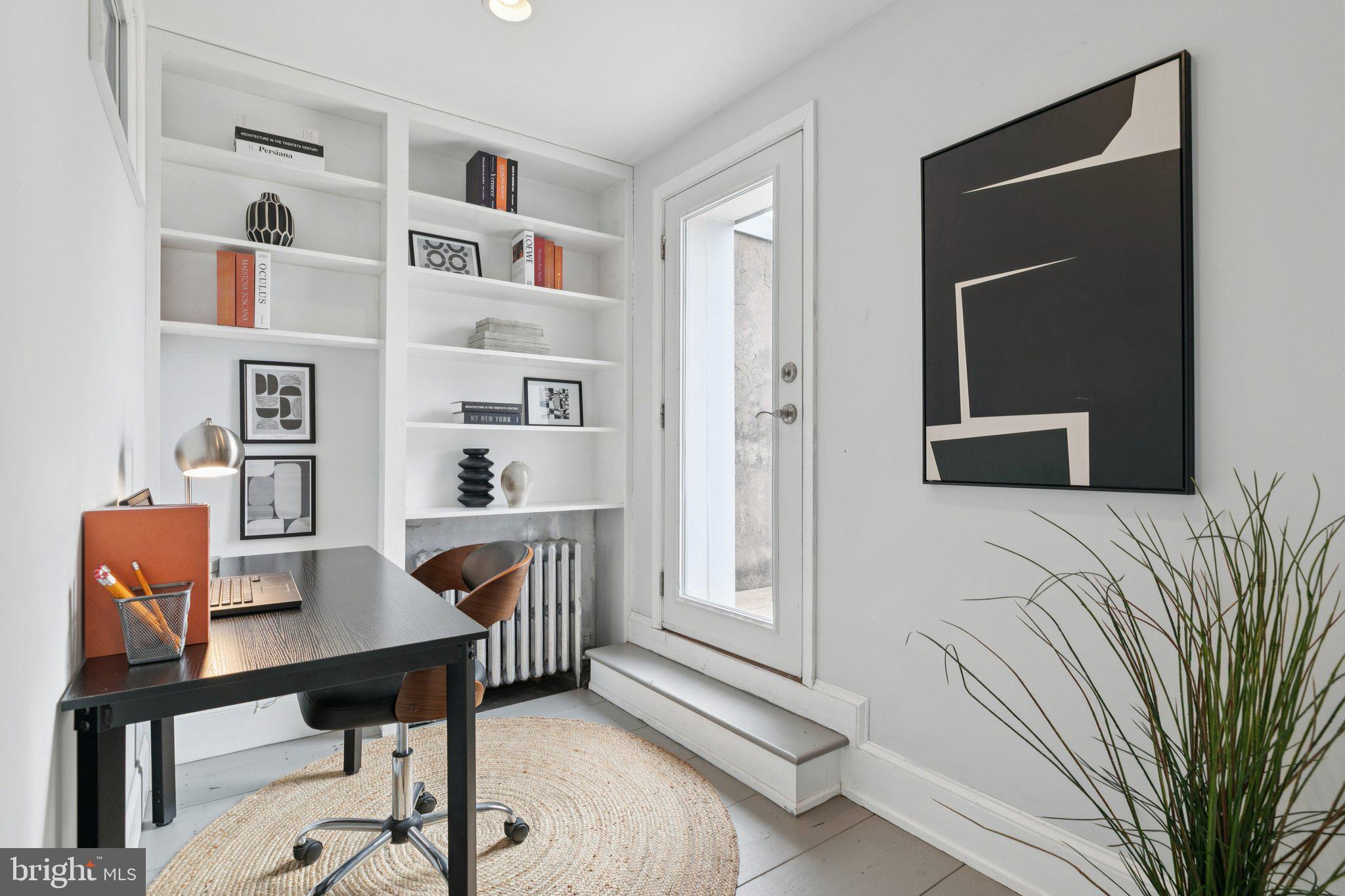 1228 Catharine Street Philadelphia, PA 19147 - Photo 34 of 48 a workspace with furniture and window