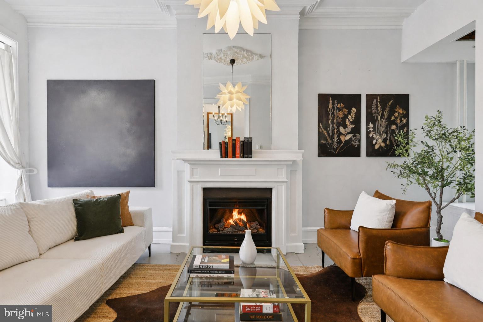 1228 Catharine Street Philadelphia, PA 19147 - Photo 4 of 48 a living room with furniture and a fireplace