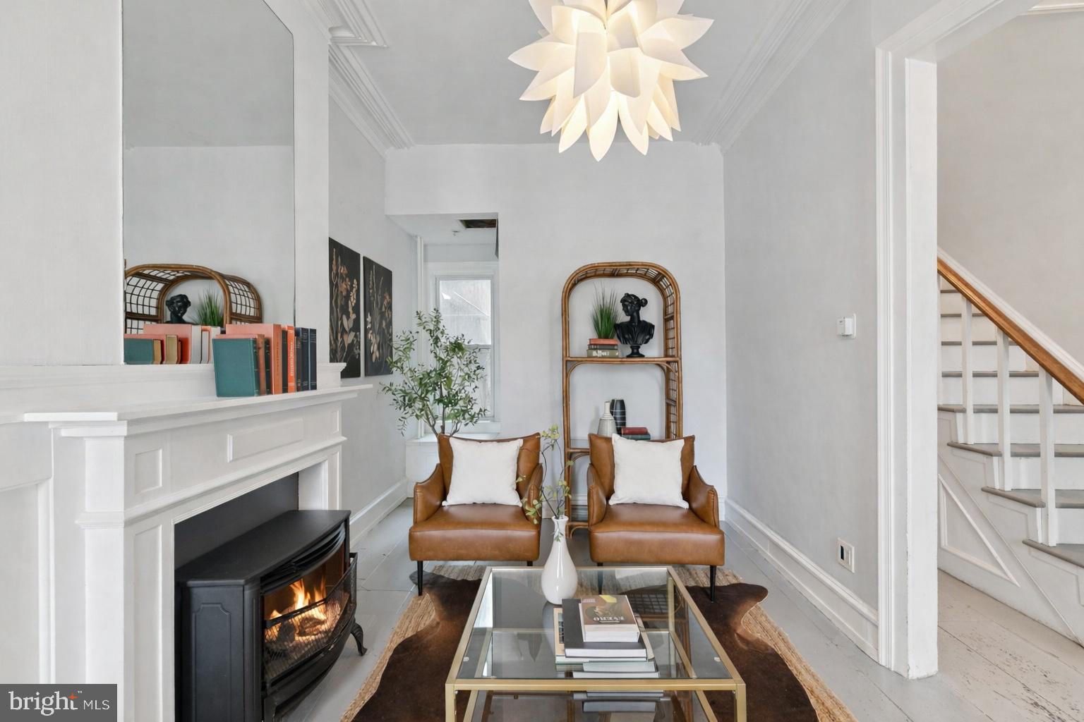 1228 Catharine Street Philadelphia, PA 19147 - Photo 6 of 48 a living room with furniture and a fireplace