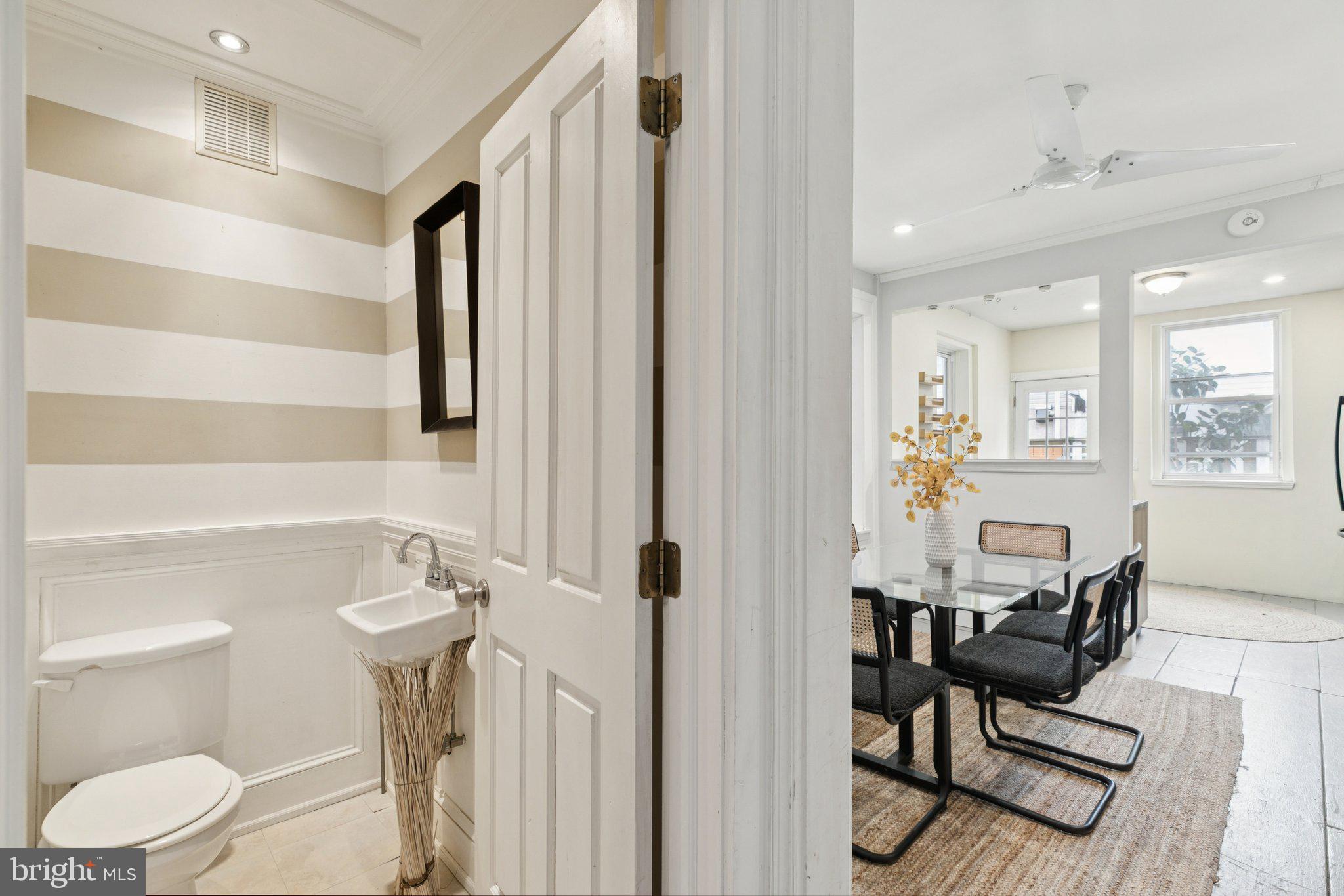 1228 Catharine Street Philadelphia, PA 19147 - Photo 9 of 48 a view of a hallway with furniture and a mirror