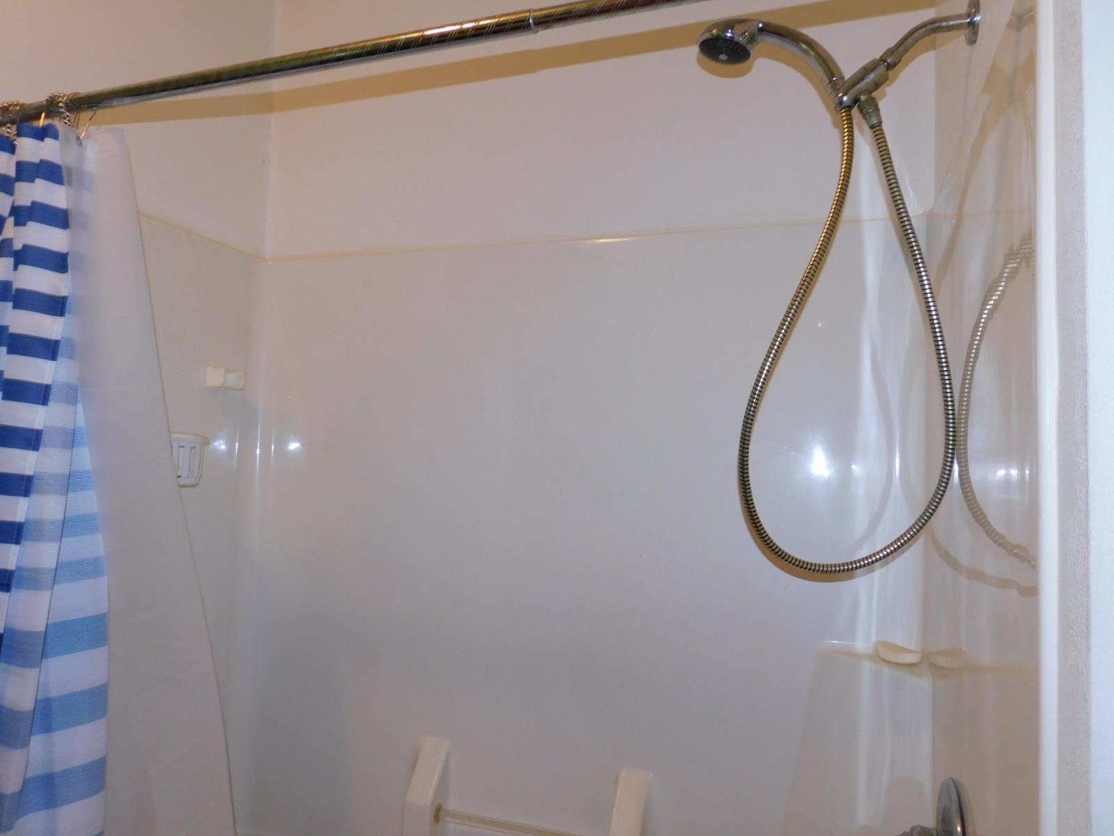 9480 State Highway 13 South Range, WI 54874 - Photo 22 of 51 Bathroom view of shower / bath combo with shower curtain