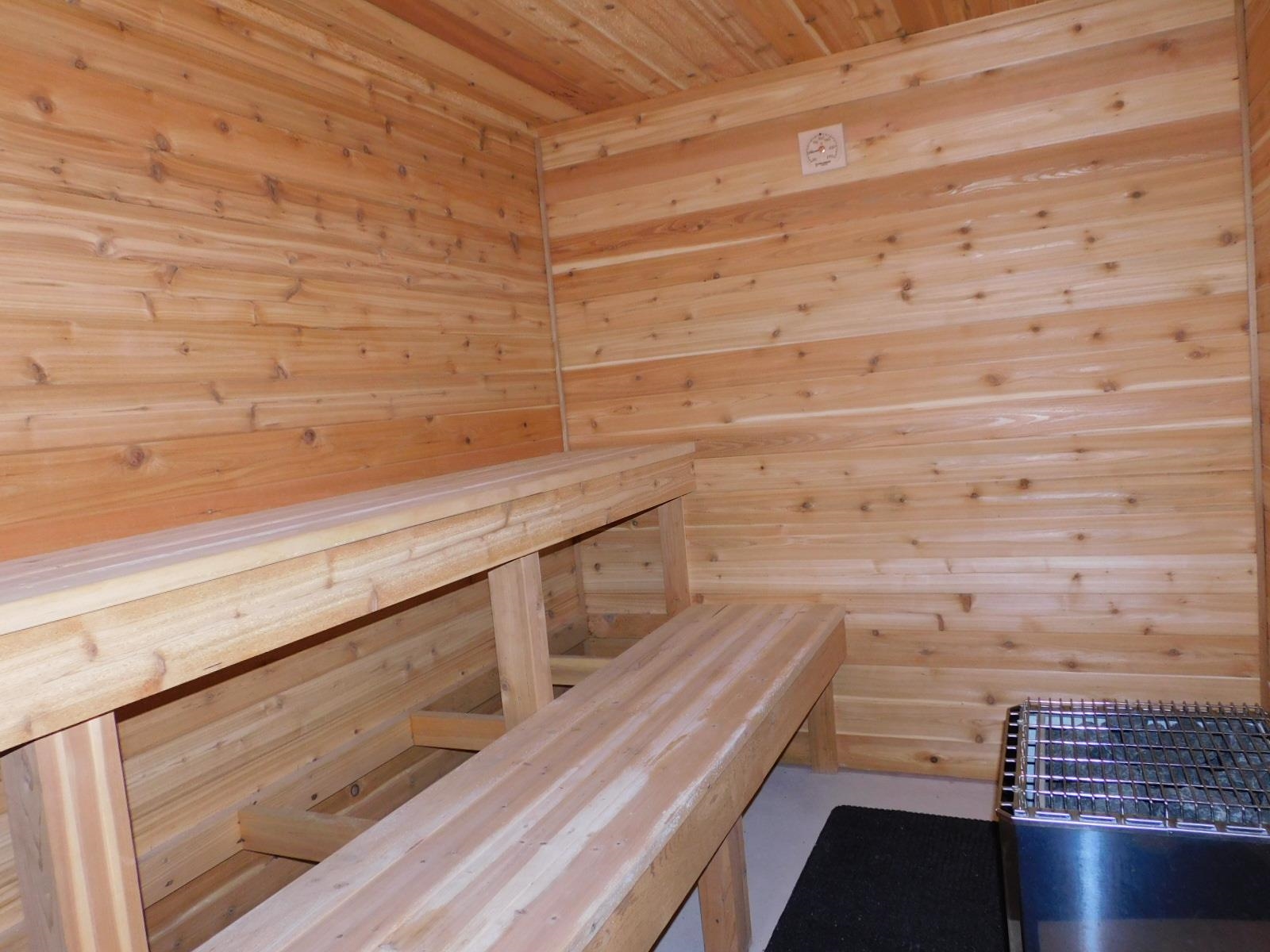 9480 State Highway 13 South Range, WI 54874 - Photo 46 of 51 Sauna featuring wood walls and wooden ceiling