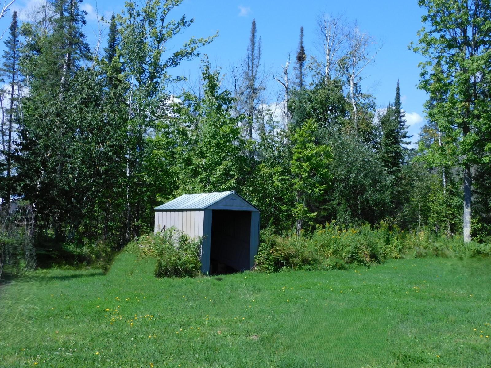 9480 State Highway 13 South Range, WI 54874 - Photo 47 of 51 View of green lawn featuring a shed