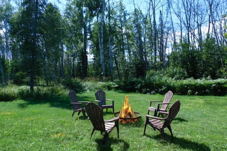 9480 State Highway 13 South Range, WI 54874 - Photo 6 of 51 Enjoy entertaining family and friends sitting by the fire pit.