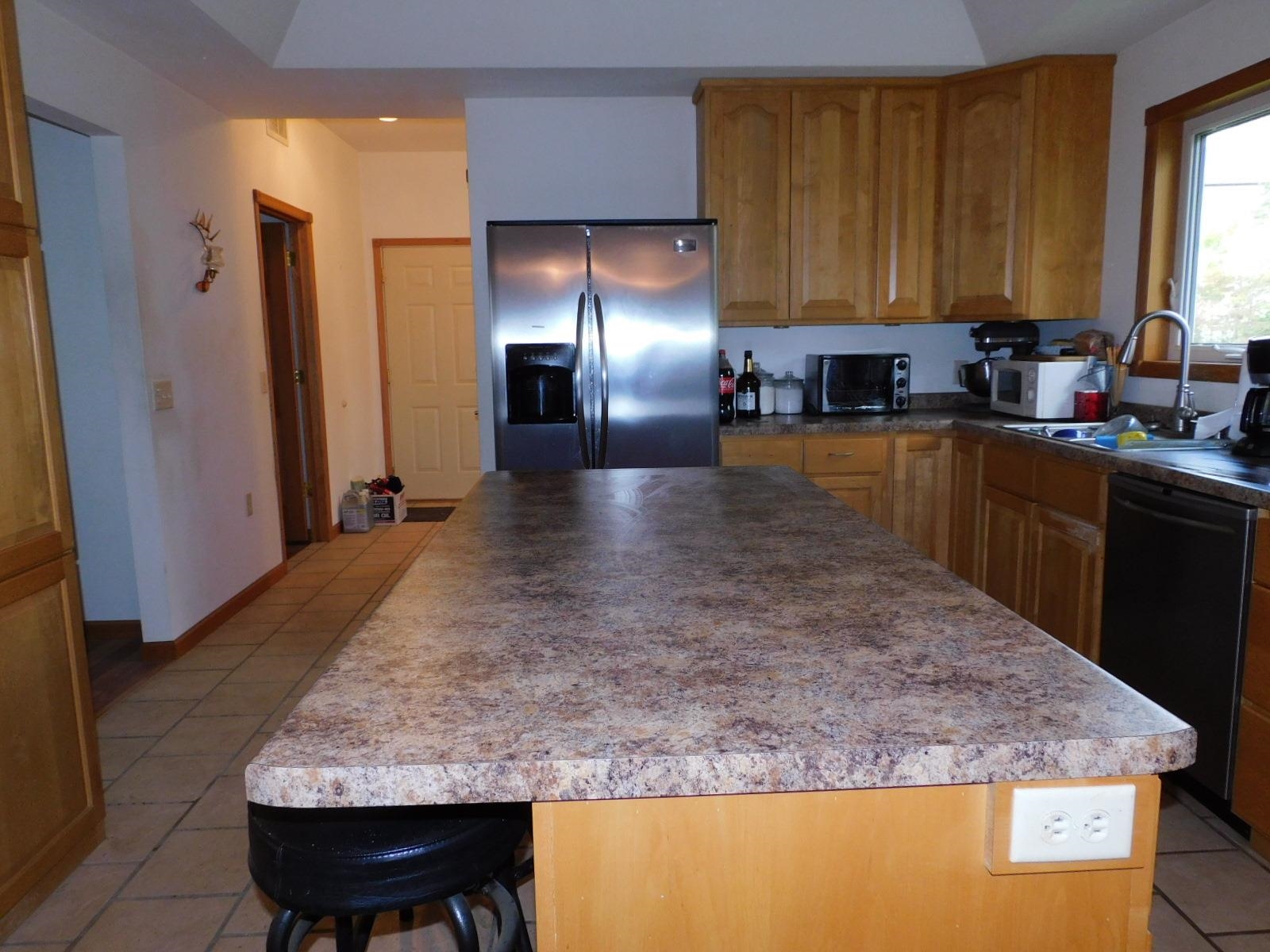 9480 State Highway 13 South Range, WI 54874 - Photo 10 of 51 With all the newer stainless steel appliances.