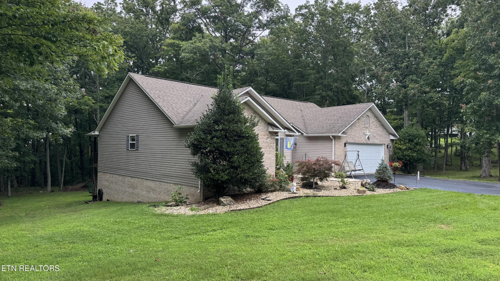 160 Brady Lane Oneida, TN 37841 - Photo 11 of 43 a view of a house with backyard and sitting area