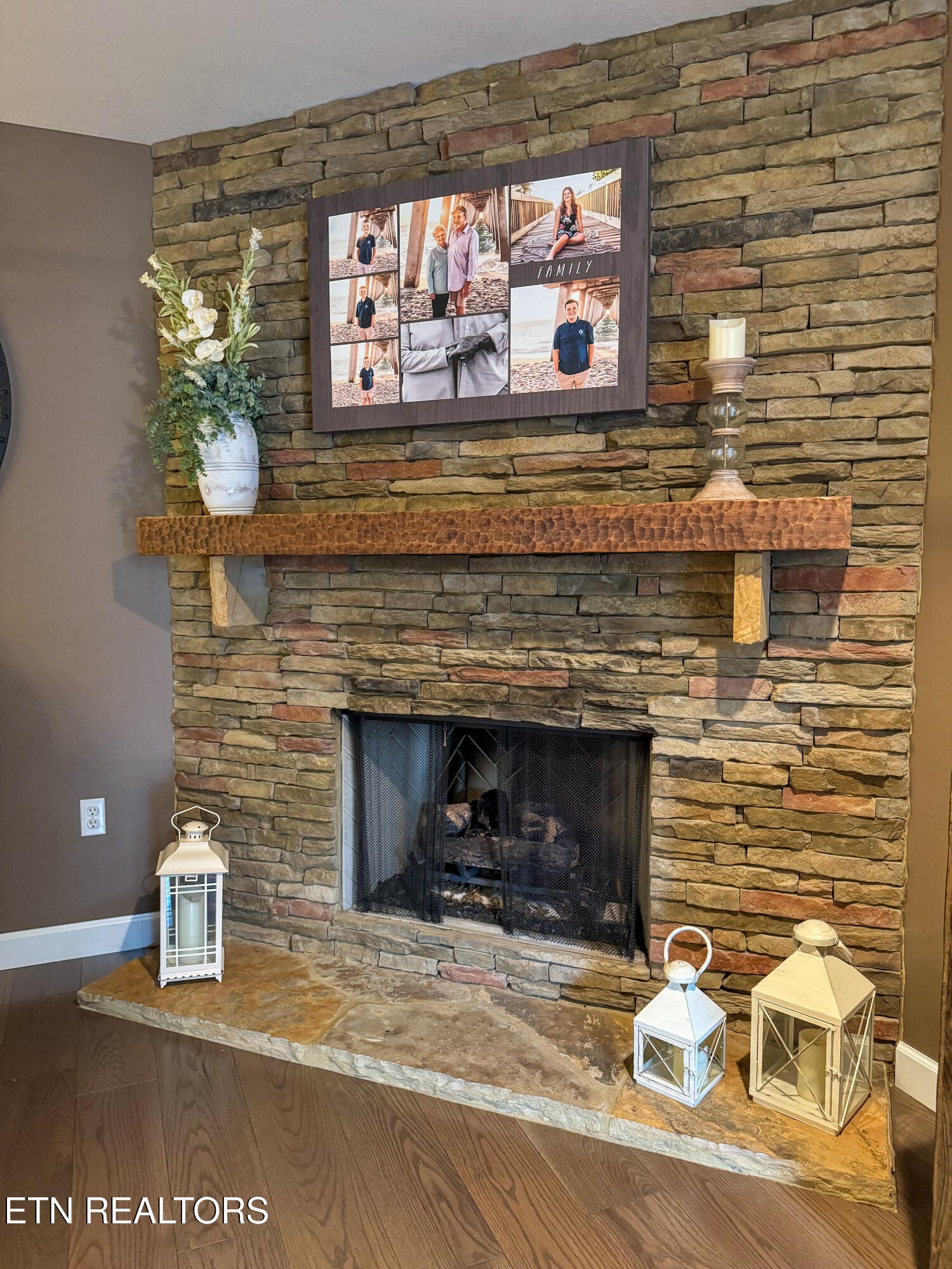 160 Brady Lane Oneida, TN 37841 - Photo 20 of 43 a view of a fireplace with wooden floor