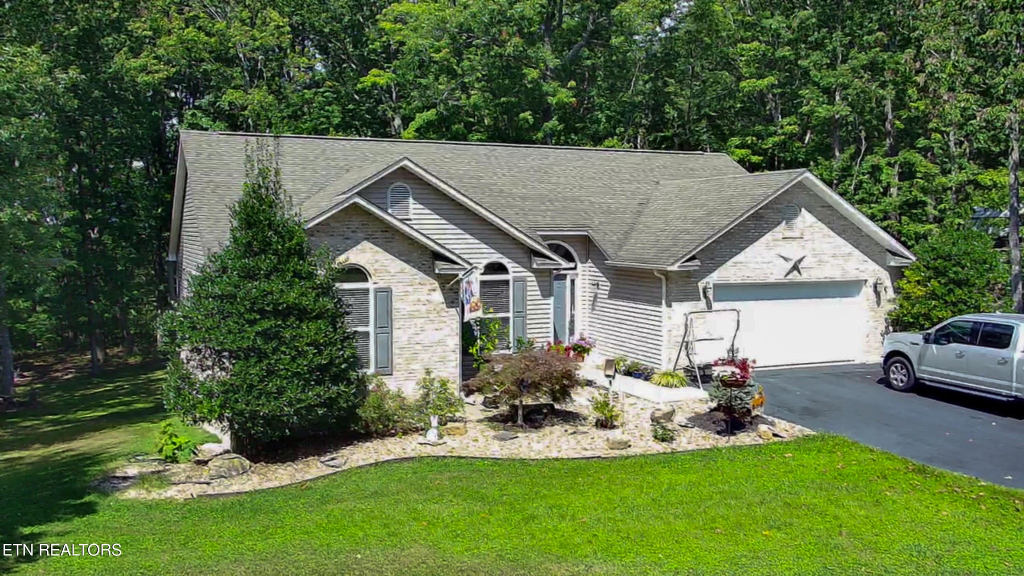 160 Brady Lane Oneida, TN 37841 - Photo 2 of 43 a view of a house with backyard and sitting area