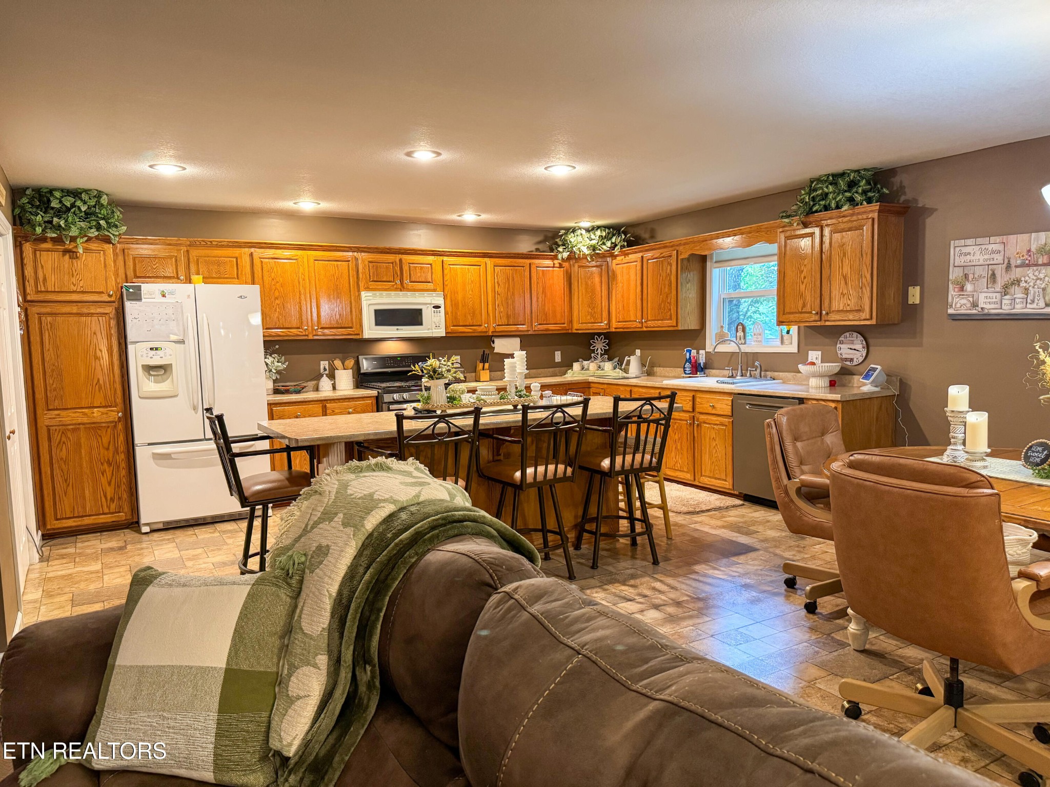 160 Brady Lane Oneida, TN 37841 - Photo 24 of 43 a view of a dining room with furniture window and wooden floor