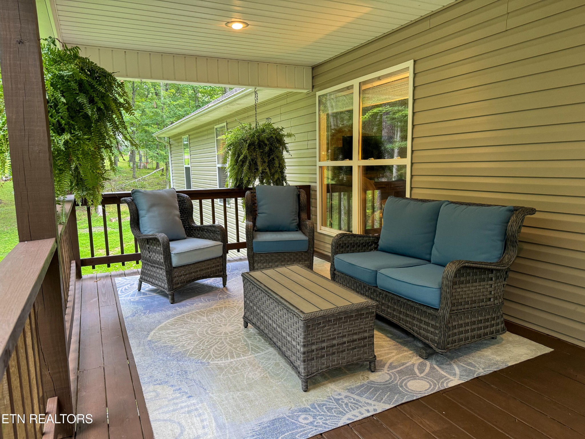 160 Brady Lane Oneida, TN 37841 - Photo 36 of 43 a balcony with furniture and a potted plant