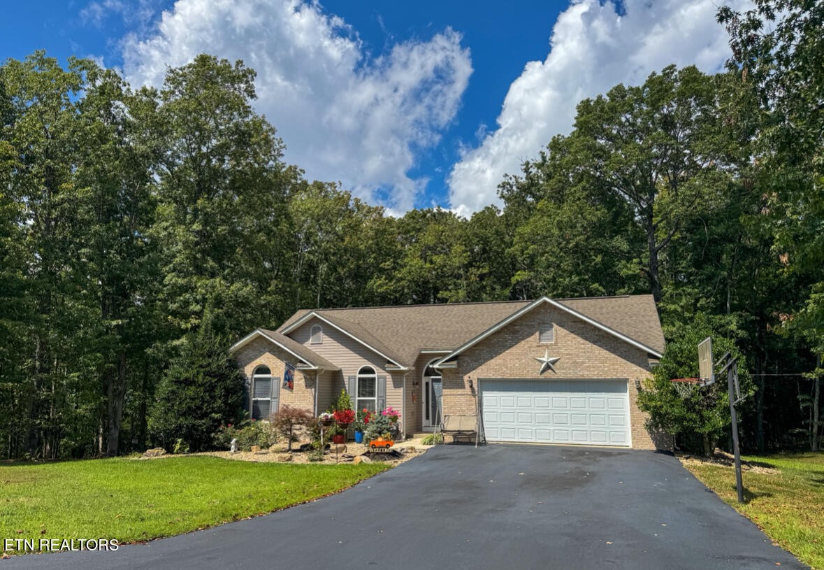 160 Brady Lane Oneida, TN 37841 - Photo 43 of 43 a front view of a house with garden