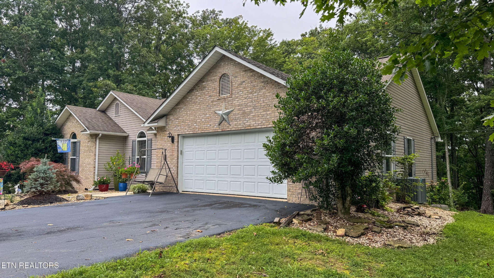 160 Brady Lane Oneida, TN 37841 - Photo 6 of 43 a view of a house with a yard and large tree
