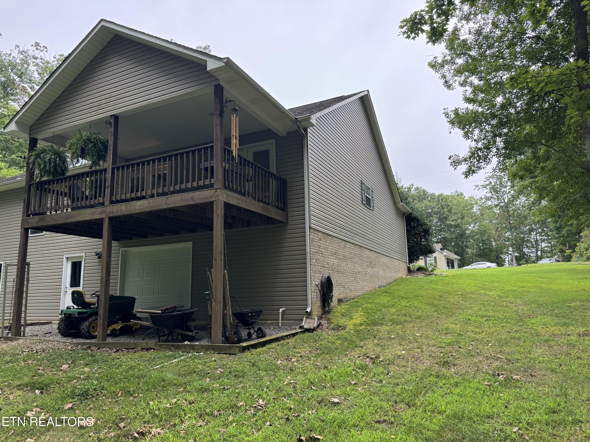 160 Brady Lane Oneida, TN 37841 - Photo 10 of 43 a view of a house with a yard and sitting area