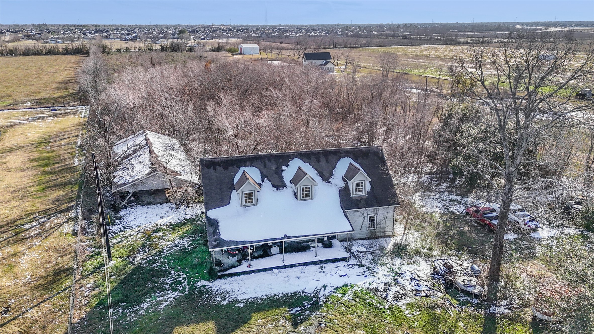 6510 Del Bello Spur Manvel, TX 77578 - Photo 16 of 21 an aerial view of a house with a yard and lake view