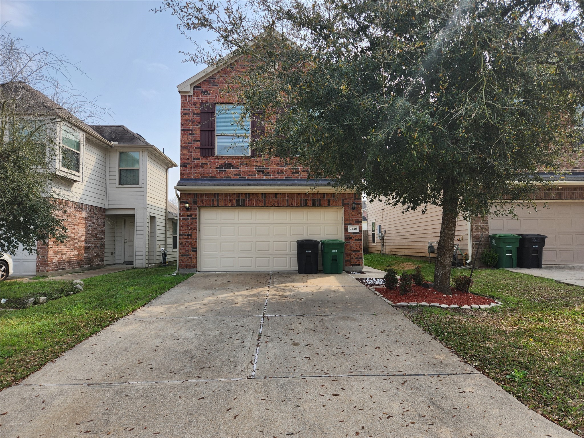 front view of a house with a patio