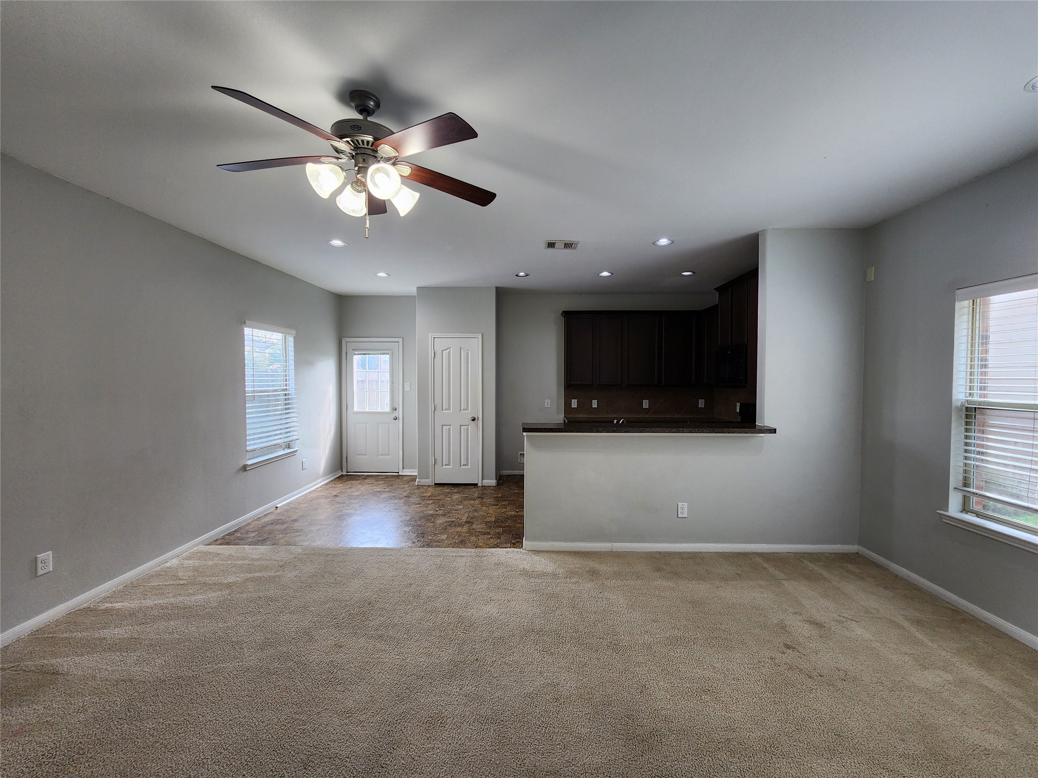 9346 Valley Tree Lane Houston, TX 77089 - Photo 7 of 21 a view of a livingroom with a ceiling fan and window